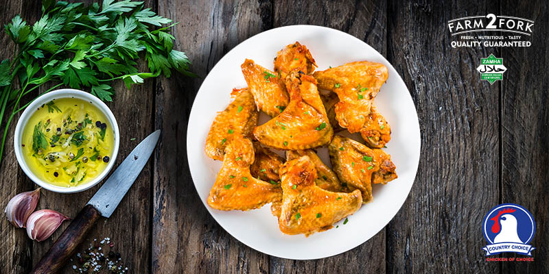 Plated chicken wings garnished with coriander | Country Choice Chicken Wings