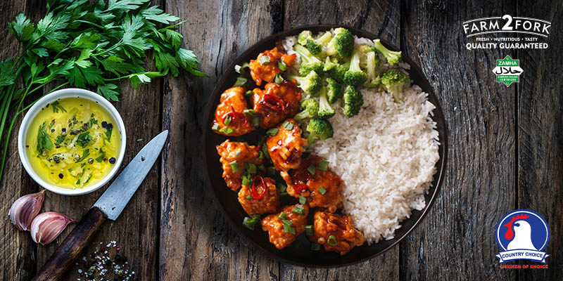 Plated 15 minute honey garlic chicken served with rice and broccoli | Country choice chicken breasts