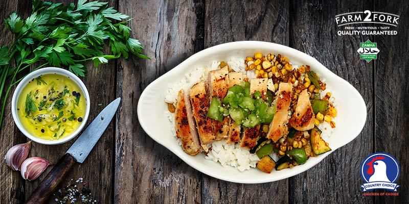 Plated rusty chicken thighs strips with rice and corn | Country Choice Chicken Thighs